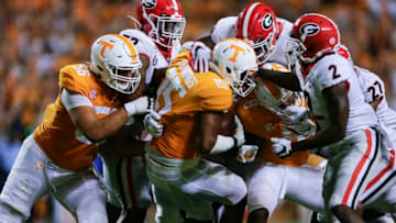 KNOXVILLE, TENNESSEE - OCTOBER 05: Juan Jennings #15 of the Tennessee Volunteers is stopped by the Georgia Bulldogs after running with the ball during the second quarter at Neyland Stadium on October 05, 2019 in Knoxville, Tennessee. (Photo by Silas Walker/Getty Images)