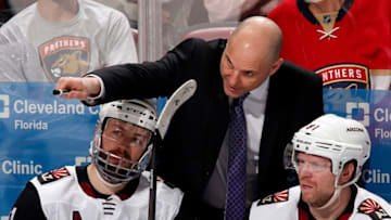 SUNRISE, FL - JANUARY 07: Arizona Coyotes Head Coach Rick Tocchet directs his team from the bench during a break in the action against the Florida Panthers at the BB&T Center on January 7, 2020 in Sunrise, Florida. (Photo by Eliot J. Schechter/NHLI via Getty Images)