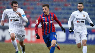 MOSCOW, RUSSIA - DECEMBER 03: Aleksandr Golovin (C) of PFC CSKA Moscow challenged by Artyom Fidler and Denys Kulakov of FC Ural Ekaterinburg during the Russian Premier League match between PFC CSKA Moscow and FC Ural Ekaterinburg at CSKA Arena Stadium on December 03, 2016 in Moscow, Russia. (Photo by Epsilon/Getty Images)