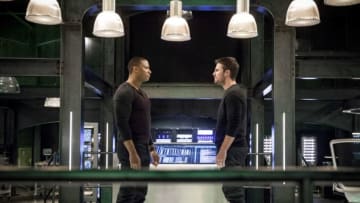 Arrow -- "Brothers in Arms" -- Image Number: AR617a_0072.jpg -- Pictured (L-R): David Ramsey as John Diggle/Spartan and Stephen Amell as Oliver Queen/Green Arrow -- Photo: Jack Rowand/The CW -- ÃÂ© 2018 The CW Network, LLC. All rights reserved.