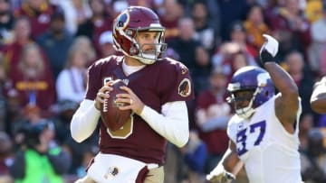 Nov 13, 2016; Landover, MD, USA; Washington Redskins quarterback Kirk Cousins (8) prepares to throw the ball as Minnesota Vikings defensive end Everson Griffen (97) chases in the first quarter at FedEx Field. The Redskins won 26-20. Mandatory Credit: Geoff Burke-USA TODAY Sports