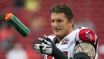 November 8, 2015; Santa Clara, CA, USA; Atlanta Falcons tackle Jake Long (75) catches a Gatorade bottle before the game against the San Francisco 49ers at Levi