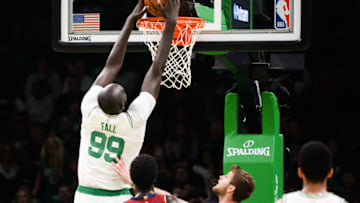 BOSTON, MA - OCTOBER 13: Tacko Fall #99 of the Boston Celtics dunks the ball against the Cleveland Cavaliers in the fourth quarter at TD Garden on October 13, 2019 in Boston, Massachusetts. NOTE TO USER: User expressly acknowledges and agrees that, by downloading and or using this photograph, User is consenting to the terms and conditions of the Getty Images License Agreement. (Photo by Kathryn Riley/Getty Images)