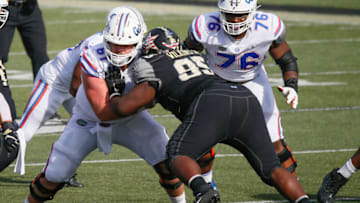 NASHVILLE, TENNESSEE - NOVEMBER 21: Brett Heggie #61 of the Florida Gators plays against the Vanderbilt Commodores at Vanderbilt Stadium on November 21, 2020 in Nashville, Tennessee. (Photo by Frederick Breedon/Getty Images)