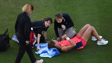 EASTBOURNE, ENGLAND - JUNE 29: Johanna Konta of Great Britain receives treatment during the ladies singles quarter final match against Angelique Kerber of Germany on day five of the Aegon International Eastbourne at Devonshire Park Lawn Tennis Club on June 29, 2017 in Eastbourne, England. (Photo by Mike Hewitt/Getty Images)