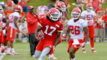 Jul 30, 2016; St. Joseph, MO, USA; Kansas City Chiefs wide receiver Chris Conley (17) runs the ball as cornerback KeiVarae Russell (26) defends during Kansas City Chiefs training camp presented by Mosaic Life Care at Missouri Western State University. Mandatory Credit: Denny Medley-USA TODAY Sports