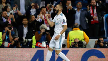 MADRID, SPAIN - MAY 01: Karim Benzema of Real Madrid celebrates after scoring 2:1 during the UEFA Champions League Semi Final Second Leg match between Real Madrid and Bayern Muenchen at the Bernabeu on May 1, 2018 in Madrid, Spain. (Photo by TF-Images/Getty Images)