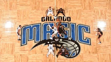 ORLANDO, FL - OCTOBER 18: Nikola Vucevic #9 of the Orlando Magic and Hassan Whiteside #21 of the Miami Heat jump for the tip off to start the game between the two teams on October 18, 2017 at the Amway Center in Orlando, Florida. NOTE TO USER: User expressly acknowledges and agrees that, by downloading and or using this Photograph, user is consenting to the terms and conditions of the Getty Images License Agreement. Mandatory Copyright Notice: Copyright 2017 NBAE (Photo by Gary Bassing/NBAE via Getty Images)