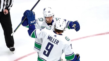 EDMONTON, ALBERTA - SEPTEMBER 01: Elias Pettersson #40 of the Vancouver Canucks is congratulated by his teammate, J.T. Miller after scoring a goal against the Vegas Golden Knights during the third period in Game Five of the Western Conference Second Round during the 2020 NHL Stanley Cup Playoffs at Rogers Place on September 01, 2020 in Edmonton, Alberta, Canada. (Photo by Bruce Bennett/Getty Images)