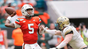 MIAMI, FLORIDA - OCTOBER 19: N'Kosi Perry #5 of the Miami Hurricanes throws a pass against the Georgia Tech Yellow Jackets during the second half at Hard Rock Stadium on October 19, 2019 in Miami, Florida. (Photo by Michael Reaves/Getty Images)