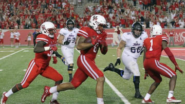 Oct 15, 2016; Houston, TX, USA; Houston Cougars linebacker Emeke Egbule (8) returns a fumble against the Tulsa Golden Hurricane for a touchdown in the second half at TDECU Stadium. Houston Cougars won 38 to 31. Mandatory Credit: Thomas B. Shea-USA TODAY Sports