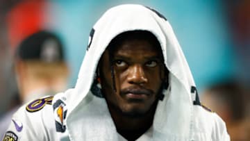 MIAMI GARDENS, FLORIDA - NOVEMBER 11: Lamar Jackson #8 of the Baltimore Ravens looks on against the Miami Dolphins at Hard Rock Stadium on November 11, 2021 in Miami Gardens, Florida. (Photo by Michael Reaves/Getty Images)
