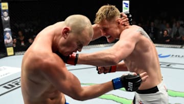 ROTTERDAM, NETHERLANDS - SEPTEMBER 02: (R-L) Alexander Volkov of Russia punches Stefan Struve of The Netherlands in their heavyweight bout during the UFC Fight Night event at the Rotterdam Ahoy on September 2, 2017 in Rotterdam, Netherlands. (Photo by Josh Hedges/Zuffa LLC/Zuffa LLC via Getty Images)