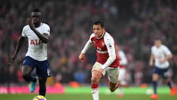 LONDON, ENGLAND - NOVEMBER 18: Davinson Sanchez of Tottenham Hotspur and Alexis Sanchez of Arsenal in action during the Premier League match between Arsenal and Tottenham Hotspur at Emirates Stadium on November 18, 2017 in London, England. (Photo by Mike Hewitt/Getty Images)