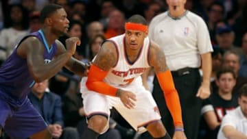 Nov 2, 2014; New York, NY, USA; New York Knicks forward Carmelo Anthony (7) works against Charlotte Hornets guard Lance Stephenson (1) during the first half at Madison Square Garden. Mandatory Credit: Jim O