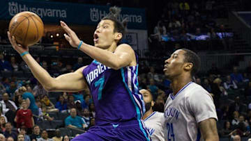 Apr 8, 2016; Charlotte, NC, USA; Charlotte Hornets guard Jeremy Lin (7) goes up for a shot against Brooklyn Nets guard Rondae Hollis-Jefferson (24) during the first half at Time Warner Cable Arena. Mandatory Credit: Jeremy Brevard-USA TODAY Sports