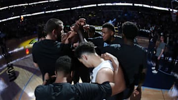 MEMPHIS, TN - FEBRUARY 23: The Memphis Grizzlies huddle before the game against the Cleveland Cavaliers on February 23, 2018 at FedExForum in Memphis, Tennessee. NOTE TO USER: User expressly acknowledges and agrees that, by downloading and or using this photograph, User is consenting to the terms and conditions of the Getty Images License Agreement. Mandatory Copyright Notice: Copyright 2018 NBAE (Photo by Joe Murphy/NBAE via Getty Images)