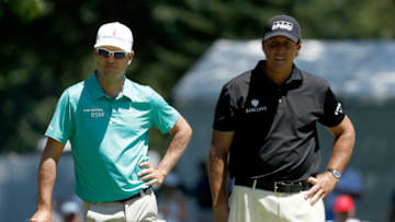 AKRON, OH - JUNE 30: Zach Johnson and Phil Mickelson prepare to putt on the sixth green during the first round of the World Golf Championships - Bridgestone Invitational at Firestone Country Club South Course on June 30, 2016 in Akron, Ohio. (Photo by Gregory Shamus/Getty Images)