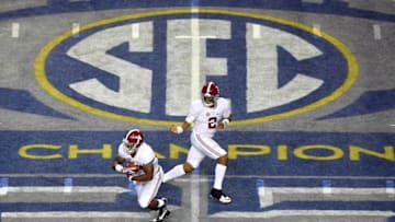 Dec 3, 2016; Atlanta, GA, USA; Alabama Crimson Tide running back Damien Harris (34) takes the handoff from quarterback Jalen Hurts (2) during the third quarter of the SEC Championship college football game at Georgia Dome. Mandatory Credit: Dale Zanine-USA TODAY Sports