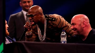 LONDON, ENGLAND - JULY 14: (R-L) Floyd Mayweather Jr. speaks to Conor McGregor during the Floyd Mayweather Jr. v Conor McGregor World Press Tour event at SSE Arena on July 14, 2017 in London, England. (Photo by Jeff Bottari/Zuffa LLC/Zuffa LLC via Getty Images)