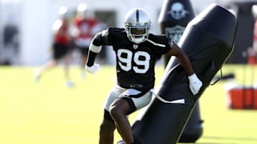 HENDERSON, NEVADA - JULY 28: Clelin Ferrell #99 of the Las Vegas Raiders runs a drill during training camp at the Las Vegas Raiders Headquarters/Intermountain Healthcare Performance Center on July 28, 2021 in Henderson, Nevada. (Photo by Steve Marcus/Getty Images)