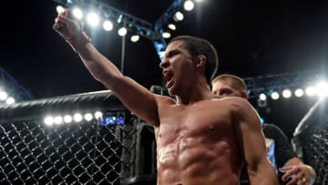 LAS VEGAS, NV - DECEMBER 03: Joseph Benavidez celebrates after his split-decision victory over Henry Cejudo in their flyweight bout during The Ultimate Fighter Finale event inside the Pearl concert theater at the Palms Resort