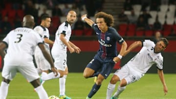 PARIS, FRANCE - AUGUST 21: David Luiz of Paris Saint-Germain in action during the French Ligue 1 match between Paris Saint-Germain and FC Metz at Parc des Princes on August 21, 2016 in Paris, France. (Photo by Xavier Laine/Getty Images)