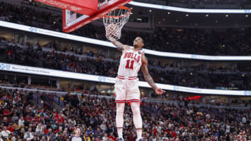 Mar 29, 2023; Chicago, Illinois, USA; Chicago Bulls forward DeMar DeRozan (11) goes up for a dunk against the Los Angeles Lakers during the first half at United Center. Mandatory Credit: Kamil Krzaczynski-USA TODAY Sports