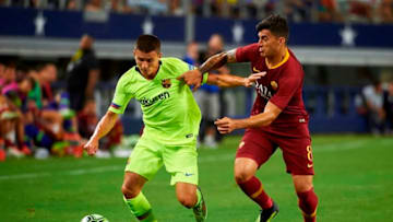 FC Barcelona's Sergio Palencia (L) fights for the ball with AS Roma's Diego Perotti during the International Champions Cup (ICC) friendly football match between AS Roma and FC Barcelona on July 31, 2018 at AT&T Stadium in Arlington, Texas. (Photo by Cooper NEILL / AFP) (Photo credit should read COOPER NEILL/AFP/Getty Images)