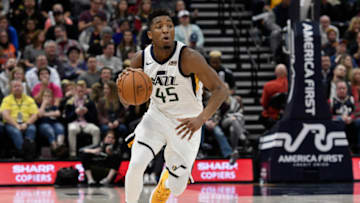 SALT LAKE CITY, UT - DECEMBER 23: Donovan Mitchell #45 of the Utah Jazz brings the ball up court in the second half of the 103-89 win by the Oklahoma City Thunder at Vivint Smart Home Arena on December 23, 2017 in Salt Lake City, Utah. (Photo by Gene Sweeney Jr./Getty Images)