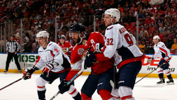 SUNRISE, FL - APRIL 1: Vincent Trocheck #21 of the Florida Panthers tangles with Evgeny Kuznetsov #92 of the Washington Capitals at the BB&T Center on April 1, 2019 in Sunrise, Florida. (Photo by Eliot J. Schechter/NHLI via Getty Images)