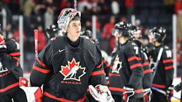 HALIFAX, CANADA - DECEMBER 31: Goaltender Thomas Milic #1 of Team Canada skates off after celebrating a victory against Team Sweden in the 2023 IIHF World Junior Championship at Scotiabank Centre on December 31, 2022 in Halifax, Nova Scotia, Canada. Team Canada defeated Team Sweden 5-1. (Photo by Minas Panagiotakis/Getty Images)