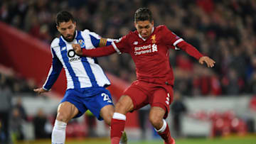 LIVERPOOL, ENGLAND - MARCH 06: Roberto Firmino of Liverpool is challenged by Felipe of FC Porto during the UEFA Champions League Round of 16 Second Leg match between Liverpool and FC Porto at Anfield on March 6, 2018 in Liverpool, United Kingdom. (Photo by Shaun Botterill/Getty Images)