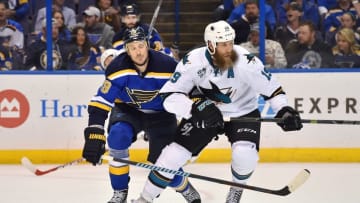 May 15, 2016; St. Louis, MO, USA; San Jose Sharks center Joe Thornton (19) and St. Louis Blues defenseman Jay Bouwmeester (19) battle for position on the ice during the second period in game one of the Western Conference Final of the 2016 Stanley Cup Playoffs at Scottrade Center. Mandatory Credit: Jasen Vinlove-USA TODAY Sports