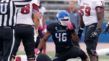 Oct 19, 2013; Buffalo, NY, USA; Buffalo Bulls linebacker Khalil Mack (46) makes a tackle during a game against the Massachusetts Minutemen at University of Buffalo Stadium. Mandatory Credit: Timothy T. Ludwig-USA TODAY Sports