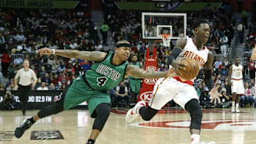 Apr 9, 2016; Atlanta, GA, USA; Boston Celtics guard Isaiah Thomas (4) knocks the ball away from Atlanta Hawks guard Dennis Schroder (17) in the first quarter of their game at Philips Arena. Mandatory Credit: Jason Getz-USA TODAY Sports