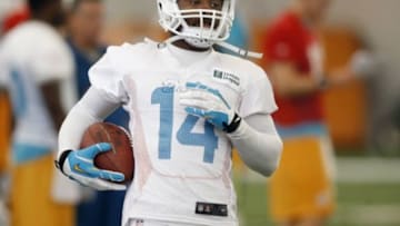 Jun 17, 2014; Davie, FL, USA; Miami Dolphins wide receiver Jarvis Landry (14) catches a pass during mini-camp at Miami Dolphins Training Facility. Mandatory Credit: Robert Mayer-USA TODAY Sports
