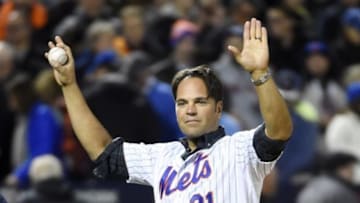 Oct 30, 2015; New York City, NY, USA; New York Mets former catcher Mike Piazza waves to the crowd before throwing the ceremonial first pitch before game three of the World Series against the Kansas City Royals at Citi Field. Mandatory Credit: Robert Deutsch-USA TODAY Sports