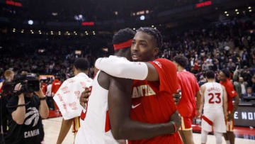 TORONTO, ON - APRIL 05: Pascal Siakam #43 of the Toronto Raptors hugs Delon Wright #0 of the Atlanta Hawks (Photo by Cole Burston/Getty Images)