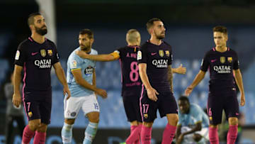 VIGO, SPAIN - OCTOBER 02: Arda Turan (1-L) and Paco Alcácer (C) of of FC Barcelona react at the end of the La Liga match between Real Club Celta de Vigo and Futbol Club Barcelona (4-3) at the Balaidos stadium on October 02, 2016 in Vigo, Spain. (Photo by Octavio Passos/Getty Images)