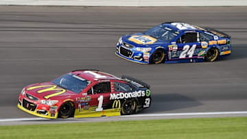 May 7, 2016; Kansas City, KS, USA; NASCAR Sprint Cup Series drivers Jamie Mcmurray (1) and Chase Elliott (24) race during the GoBowling.com 400 at Kansas Speedway. Mandatory Credit: Jasen Vinlove-USA TODAY Sports