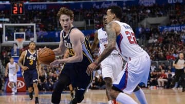 Feb 1, 2014; Los Angeles, CA, USA; Los Angeles Clippers small forward Matt Barnes (22) defends Utah Jazz shooting guard Gordon Hayward (20) in the first half of the game at Staples Center. Mandatory Credit: Jayne Kamin-Oncea-USA TODAY Sports