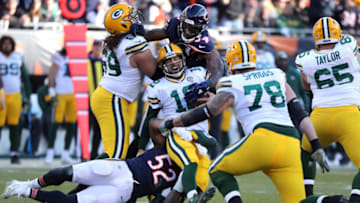 Chicago Bears outside linebackers Khalil Mack (52) and Leonard Floyd (94) sack Green Bay Packers quarterback Aaron Rodgers (12) on December 16, 2018, at Soldier Field in Chicago. (Chris Sweda/Chicago Tribune/TNS via Getty Images)