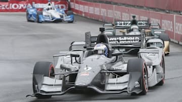 Jun 14, 2015; Toronto, Ontario, CAN; IndyCar Series driver Scott Dixon (9) leads Luca Filippi (20) going into turn 2 at the Honda Indy Toronto at Exhibition Place. Mandatory Credit: John E. Sokolowski-USA TODAY Sports