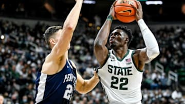 Michigan State's Mady Sissoko, right, scores as Penn State's John Harrar defends during the first half on Saturday, Dec. 11, 2021, at the Breslin Center in East Lansing.211211 Msu Penn State Bball 053a