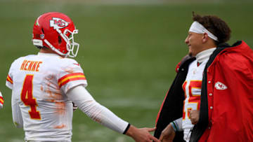DENVER, CO - OCTOBER 25: Chad Henne #4 of the Kansas City Chiefs is congratulated by Patrick Mahomes #15 after scoring a rushing touchdown against the Denver Broncos at Empower Field at Mile High on October 25, 2020 in Denver, Colorado. (Photo by Dustin Bradford/Getty Images)