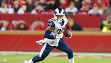 SANTA CLARA, CALIFORNIA - DECEMBER 21: Todd Gurley #30 of the Los Angeles Rams carries the ball against the San Francisco 49ers during the second half of an NFL football game at Levi's Stadium on December 21, 2019 in Santa Clara, California. (Photo by Thearon W. Henderson/Getty Images)