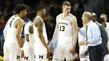 Michigan basketball coach John Beilein. speaks to his players during a delay in the game against the Montana Grizzlies during the second half of the first round of the 2018 NCAA Men's Basketball Tournament at INTRUST Arena on March 15, 2018 in Wichita, Kansas. (Photo by Jamie Squire/Getty Images)