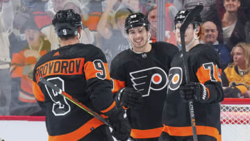 PHILADELPHIA, PA - APRIL 24: Ivan Provorov #9, Noah Cates #49, and Owen Tippett #74 of the Philadelphia Flyers react against the Pittsburgh Penguins at the Wells Fargo Center on April 24, 2022 in Philadelphia, Pennsylvania. The Philadelphia Flyers defeated the Pittsburgh Penguins 4-1. (Photo by Mitchell Leff/Getty Images)