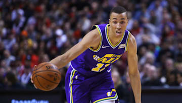 TORONTO, ON - JANUARY 1: Dante Exum #11 of the Utah Jazz dribbles the ball during the second half of an NBA game against the Toronto Raptors at Scotiabank Arena on January 1, 2019 in Toronto, Canada. NOTE TO USER: User expressly acknowledges and agrees that, by downloading and or using this photograph, User is consenting to the terms and conditions of the Getty Images License Agreement. (Photo by Vaughn Ridley/Getty Images)